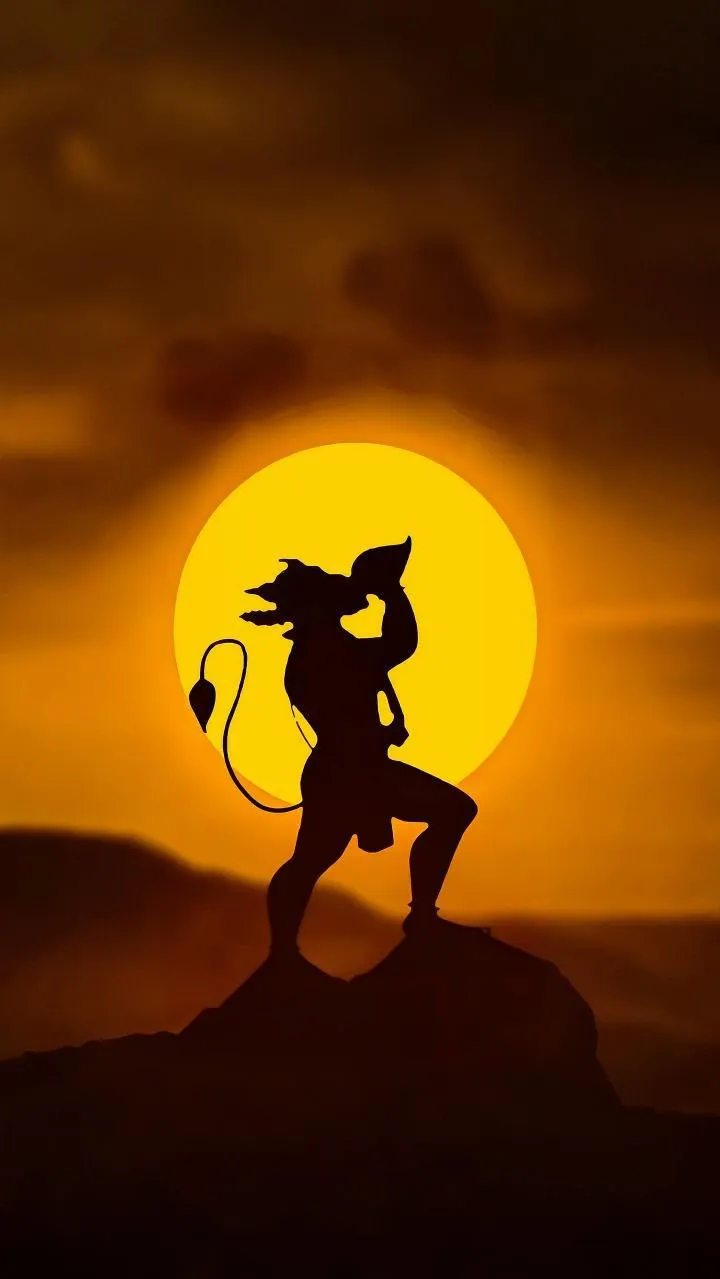 Sunset Valor Lord Hanuman Silhouette with Sun Halo Wallpaper